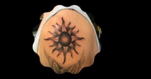 shoulder sun tattoo